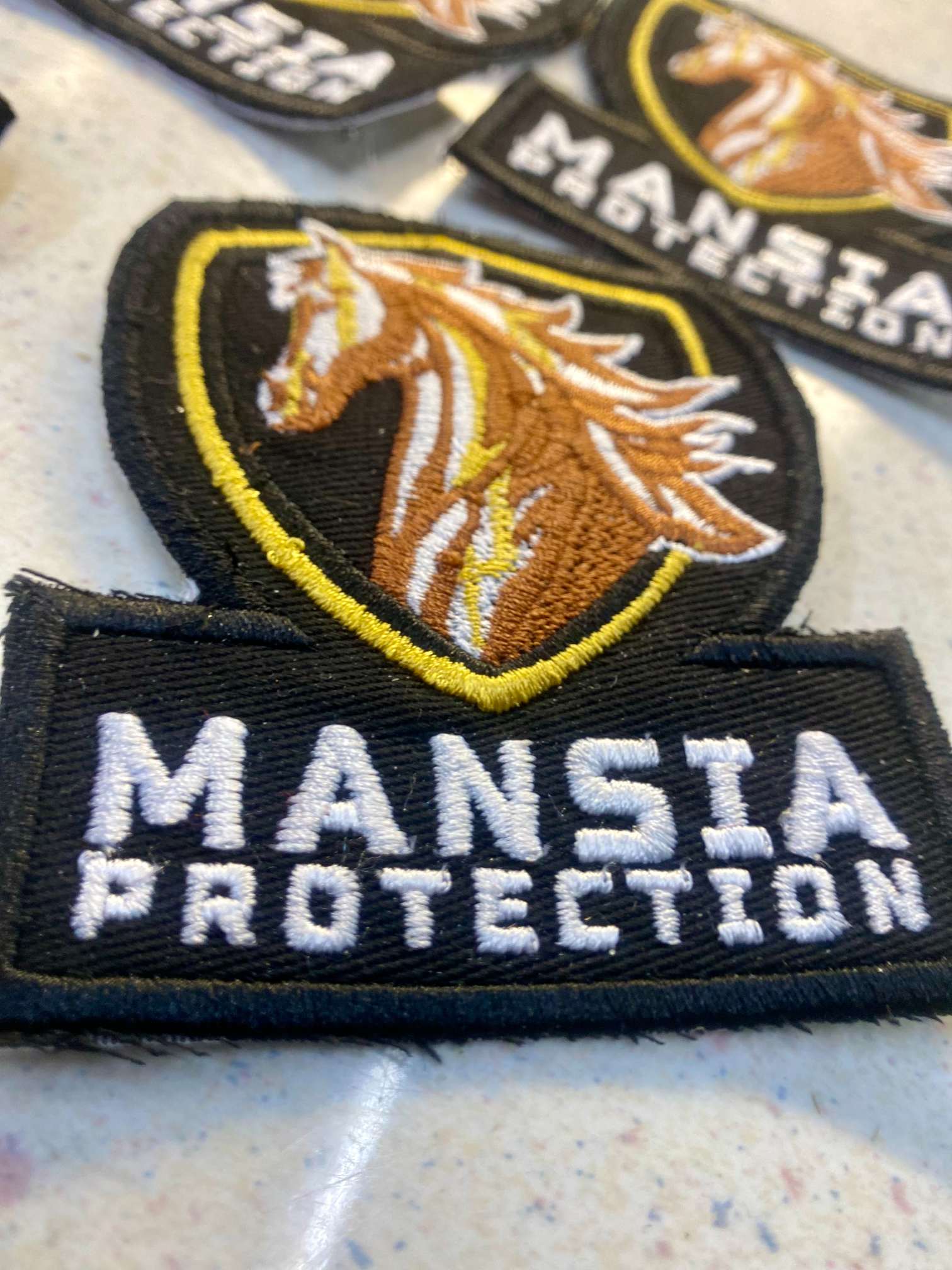 Mansia Protection embroidered patches